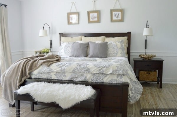 Calm and inviting master bedroom makeover by Table + Hearth, featuring soft colors, balanced textures, and serene patterns.