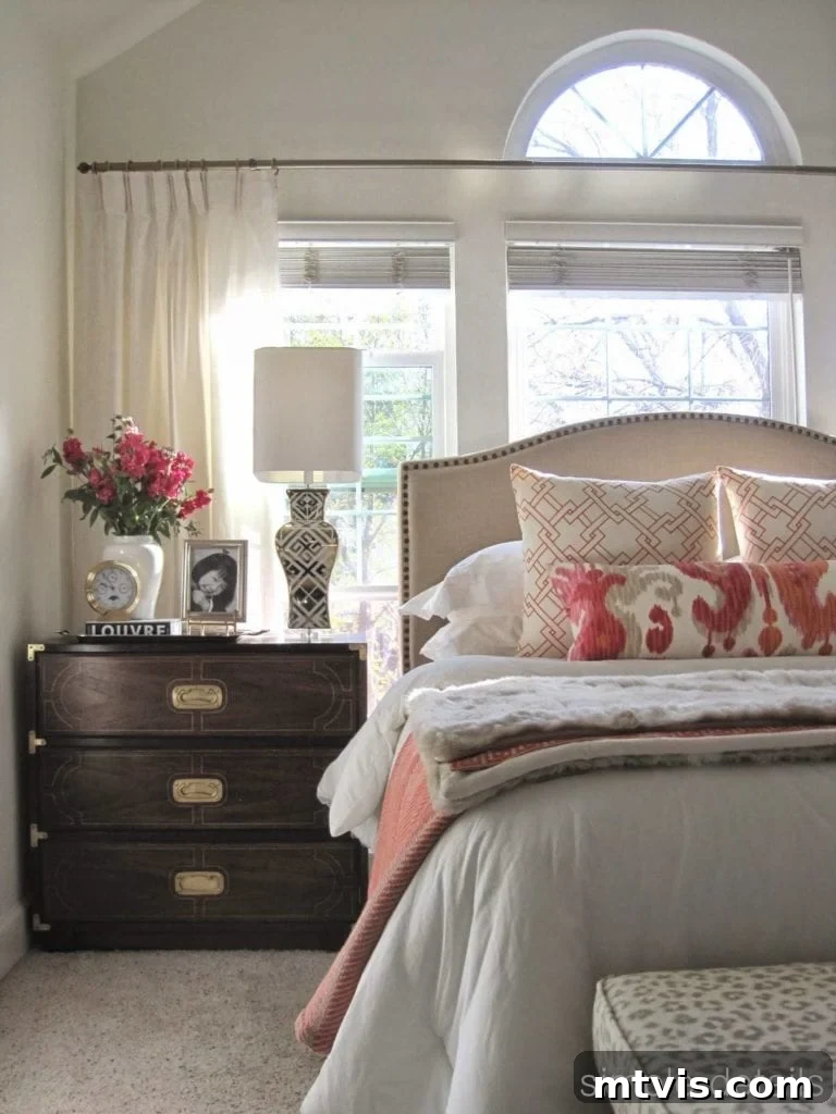 Stunning master bedroom makeover featuring repurposed Craigslist finds and a budget-friendly Walmart headboard, proving high style on a low budget.