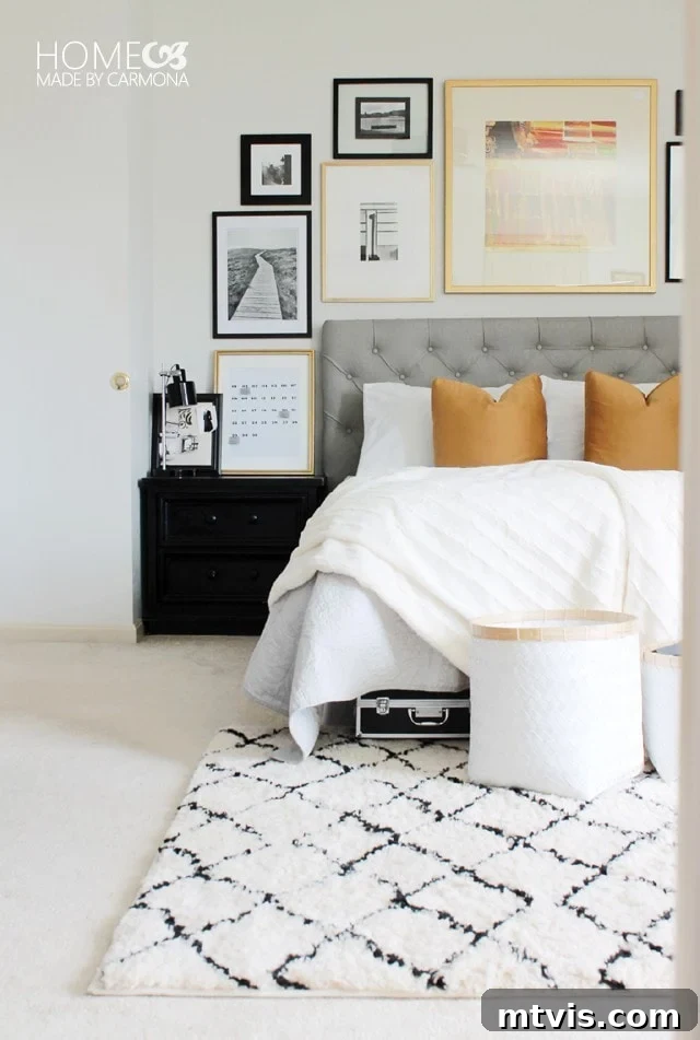 Classy and modern master bedroom makeover by Homemade by Carmona, featuring an elegant DIY tufted headboard and budget-friendly upscale decor.