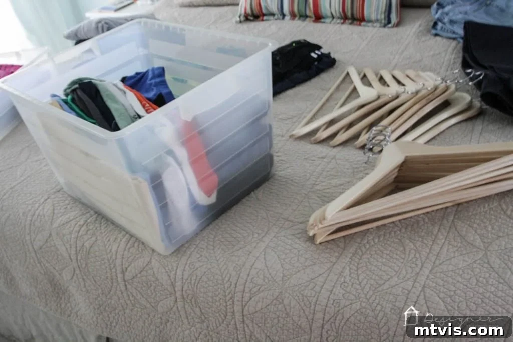 Conquer Your Closet Chaos in 2 Hours 5 All closet items removed and spread out on the floor and bed