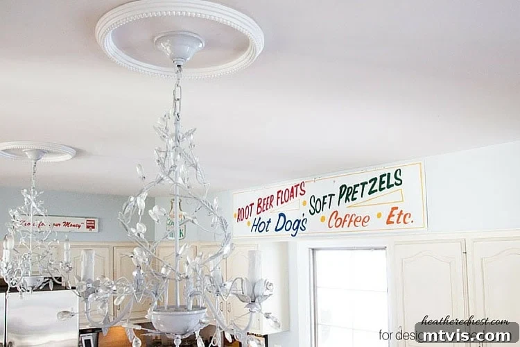 Elevate Your Lighting: Recessed to Pendant Conversion 2 Effortlessly transform your recessed lights into stylish pendant fixtures using this simple DIY tutorial from The Heathered Nest, featured on designertrapped.com.