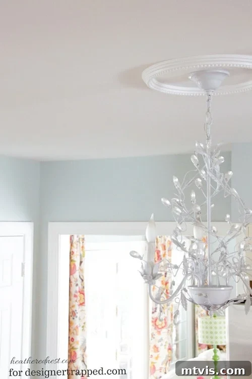 Elevate Your Lighting: Recessed to Pendant Conversion 12 A quick tip: paint your ceiling medallion before installation for a custom, seamless look.