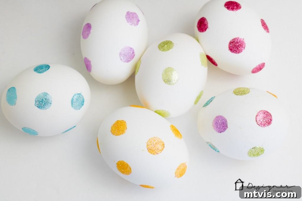 Sparkle and Spot: Creative Easter Egg Decorating 7 Finished glitter dotted Easter eggs displayed beautifully