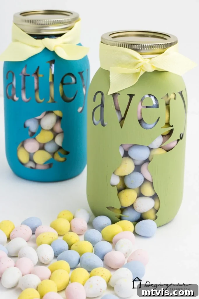 Craft Your Own Custom Mason Jars 6 A close-up view of a personalized blue mason jar, showcasing the crisp vinyl stencil work against the chalk paint, ready for gifting.