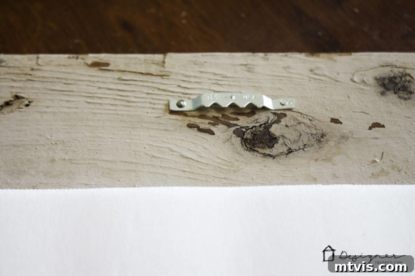 Attaching hanging hardware to the back of a DIY frame