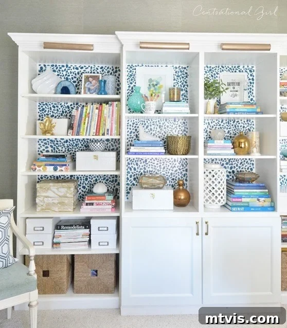 50 IKEA Hacks You Won't Believe Are IKEA 25 Custom Besta and Billy bookcases from IKEA are featured, complete with integrated lower cabinet doors and elegant gold light fixtures mounted at the top. The shelves, adorned with books and knickknacks, reveal a graphic polka-dot backing, adding a playful yet sophisticated touch to the built-in design.