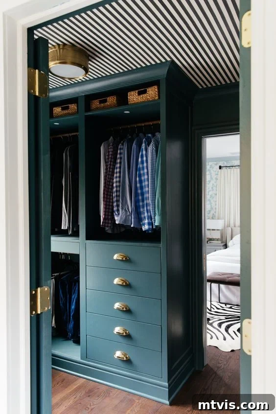 50 IKEA Hacks You Won't Believe Are IKEA 36 A luxurious dark green custom closet, ingeniously crafted from DIY IKEA hacks using Pax shelves and drawers. The upper sections feature hanging clothes, while the deep drawers below provide ample organized storage for a truly bespoke and functional wardrobe.