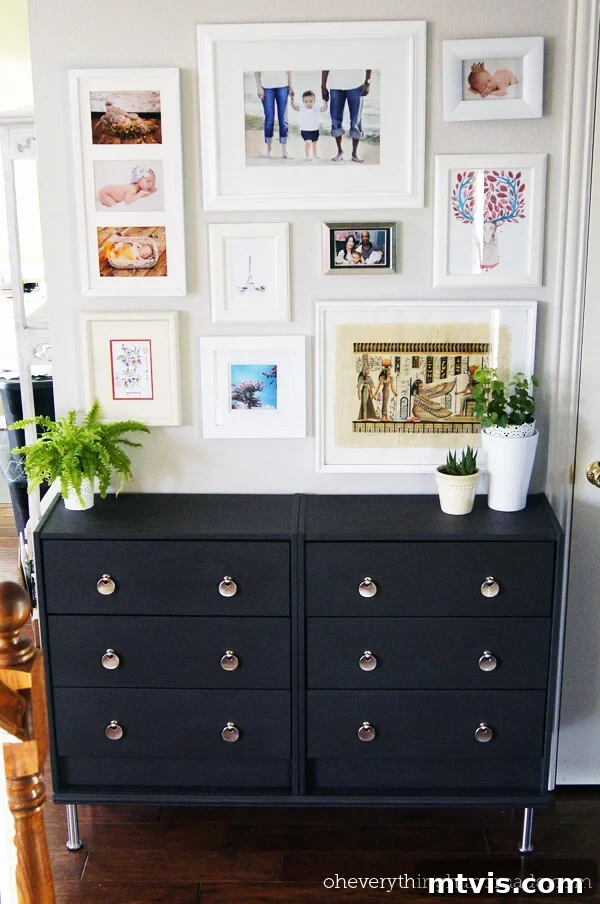 50 IKEA Hacks You Won't Believe Are IKEA 5 Two IKEA Rast dressers skillfully painted in a sophisticated black finish, adorned with metallic hardware. Above, framed photos create a gallery wall, while the text 'oheverythinghandmade.com' is visible. This transformation highlights how DIY IKEA hacks can significantly upgrade furniture.