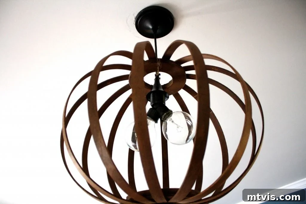 Create a High End Bentwood Pendant For Less 12 The completed DIY Bentwood Pendant Light illuminating a modern living space.
