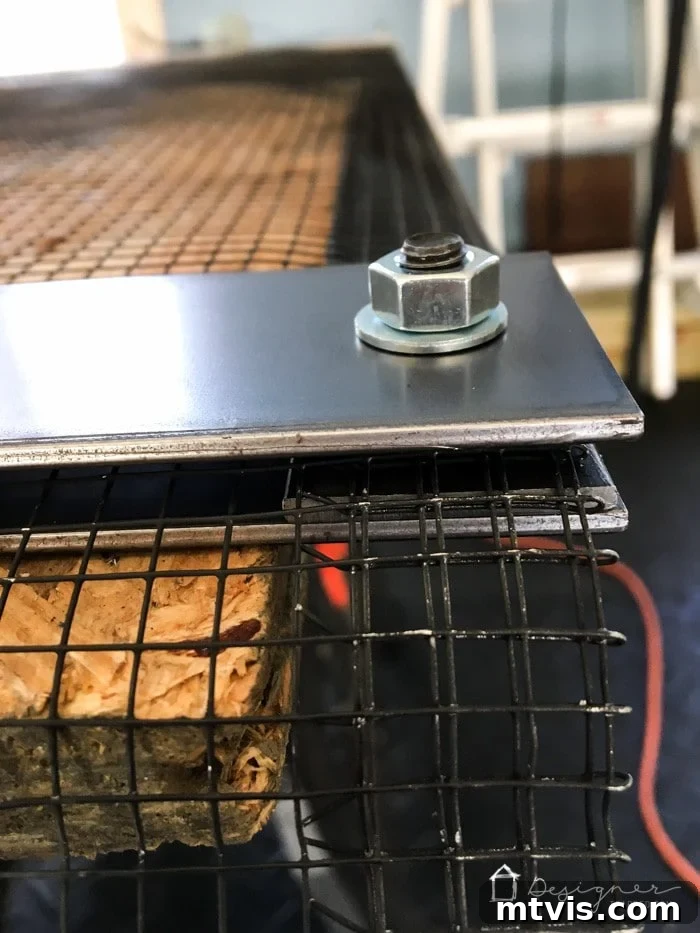 Detailed view of screen frame bolted together