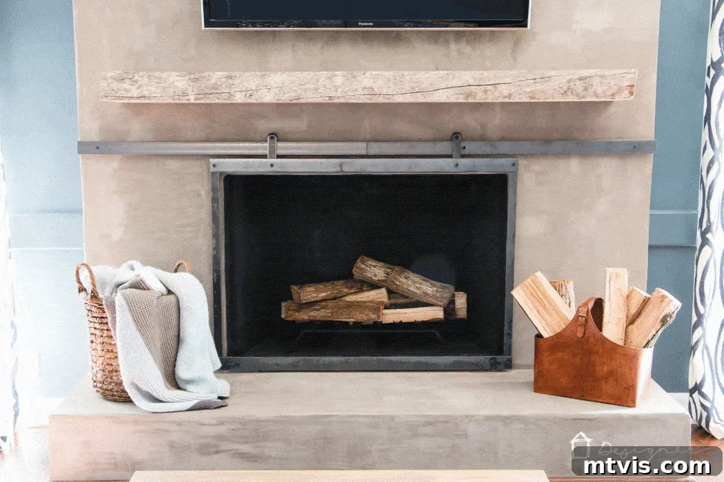 Finished barn door style sliding fireplace screen in a modern living room