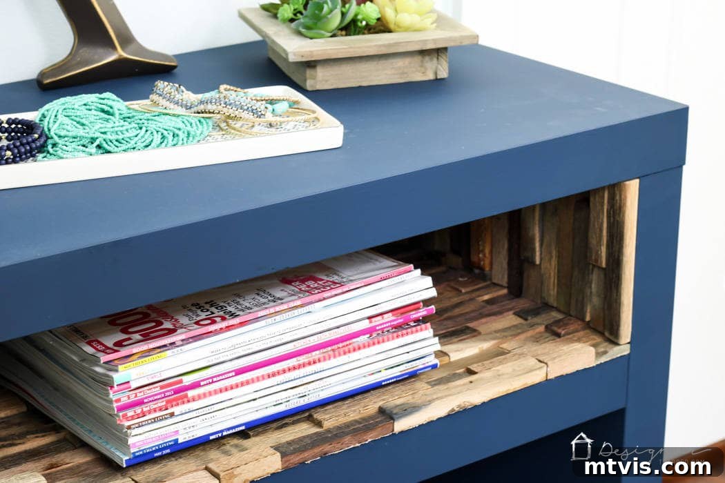 Upgrade Your IKEA Lack Designer Style Without the Price Tag 12 The finished IKEA Lack hack product is painted blue with a wood mosaic inner shelf with a stack of magazines and a tray for beaded jewelry on top.
