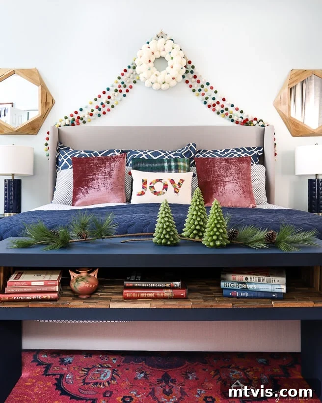Upgrade Your IKEA Lack Designer Style Without the Price Tag 13 A blue IKEA lack hack table at foot of bed with a pillow that says, "Joy."