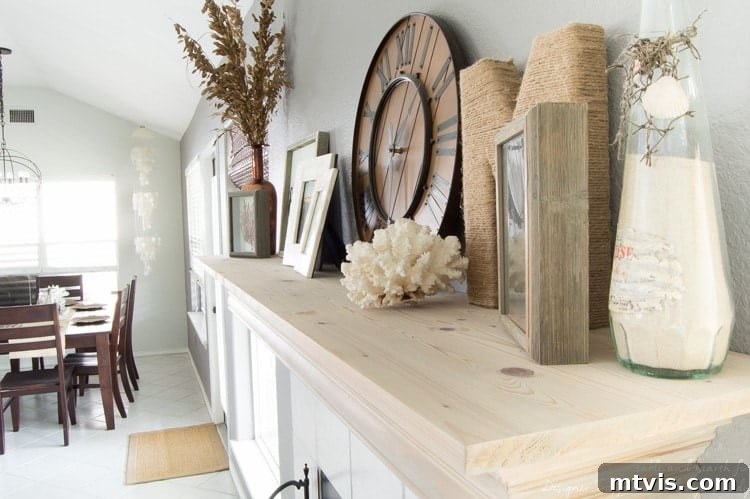 Build Your Own Driftwood Fireplace Mantel 12 Enjoying the enhanced beauty of the living room with the stylish and custom-built DIY fireplace mantel.