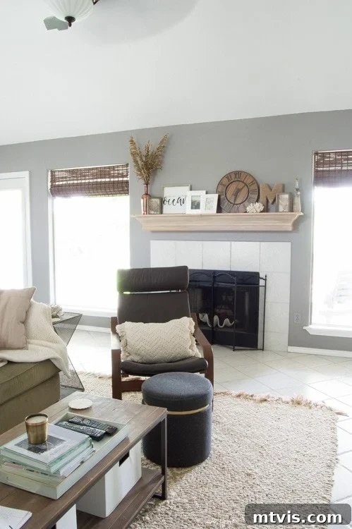 Build Your Own Driftwood Fireplace Mantel 13 Another perspective of the transformed fireplace mantel, highlighting its improved proportions and elegant finish.