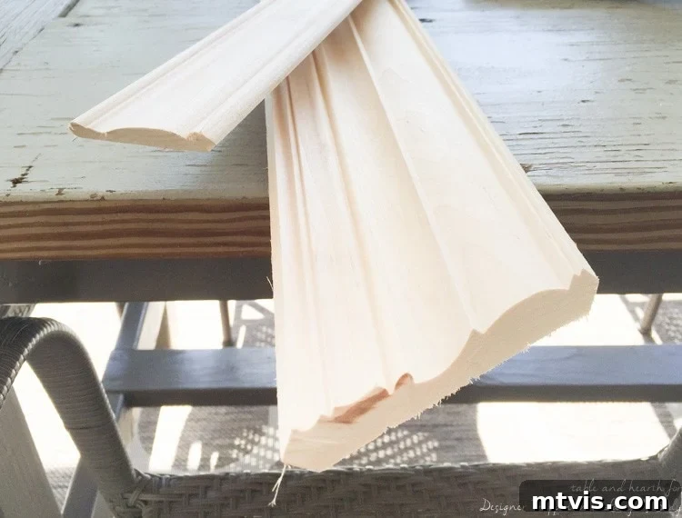 Build Your Own Driftwood Fireplace Mantel 4 Visualize your molding arrangement; combining crown and flat molding adds depth and classic appeal to your DIY fireplace mantel.