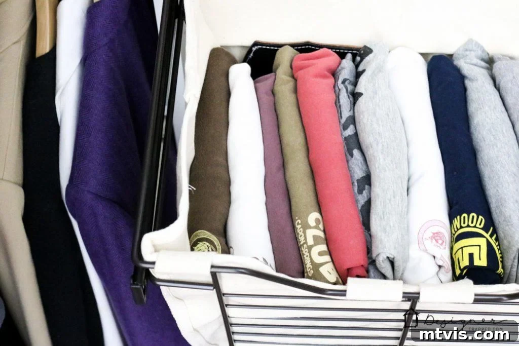 DIY Closet Makeover: Obsessed with the Results! 20 The meticulous design of the DIY closet system ensures every item has its place, from folded clothes to shoes and accessories.