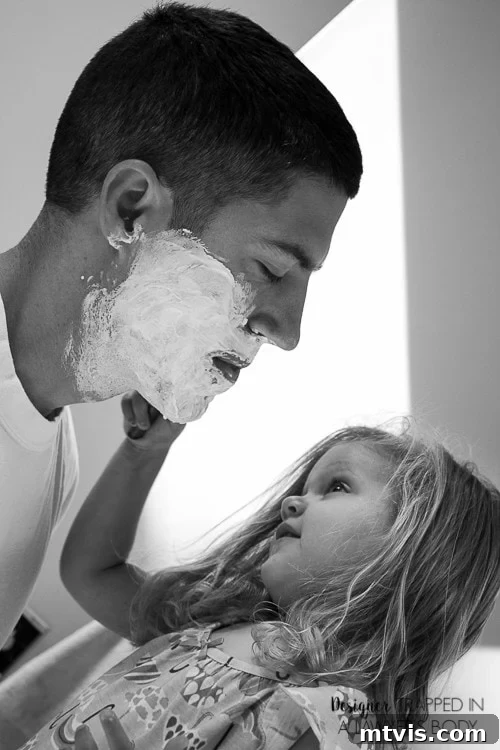 Fathers Day Photos The Ultimate Gift 5 Little girl putting shaving cream on her dad's face, a sweet Father's Day memory