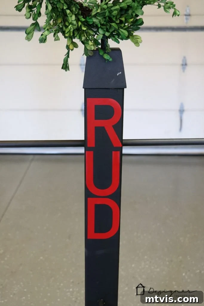 Decorating the stocking stand with reindeer names in vinyl