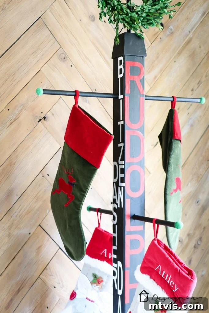 Festive Christmas stockings hanging on the DIY stand