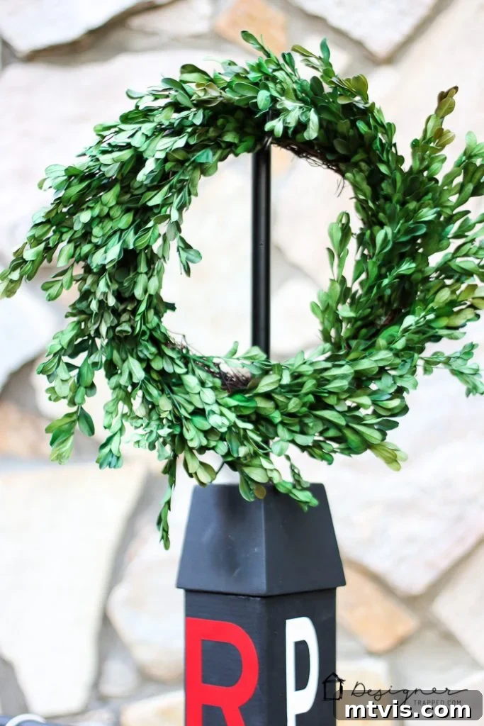 Close-up of the outdoor lantern display on the DIY stand