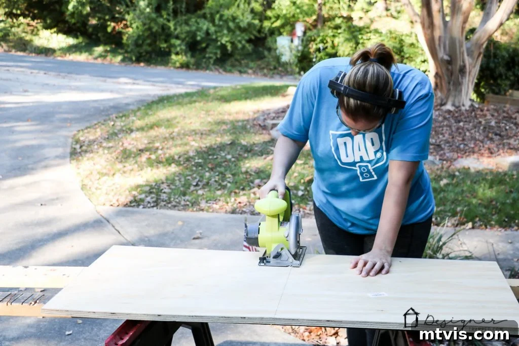 Cutting the plywood base for the holiday stocking stand