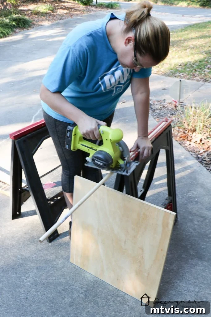 Cutting the wooden dowel for hanging stockings