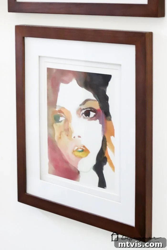 The artistic details on the gallery wall, including unique wall vases, contribute to the charming and personalized ambiance of this successful DIY bathroom remodel.