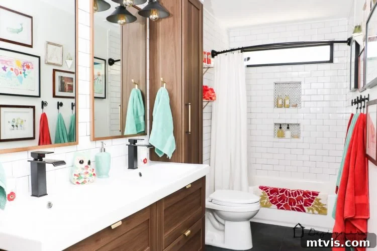 Experience the 'after' of this impressive DIY bathroom remodel, featuring elegant floor-to-ceiling subway tile, striking black slate floor, and a sleek floating vanity, all created by homeowners.