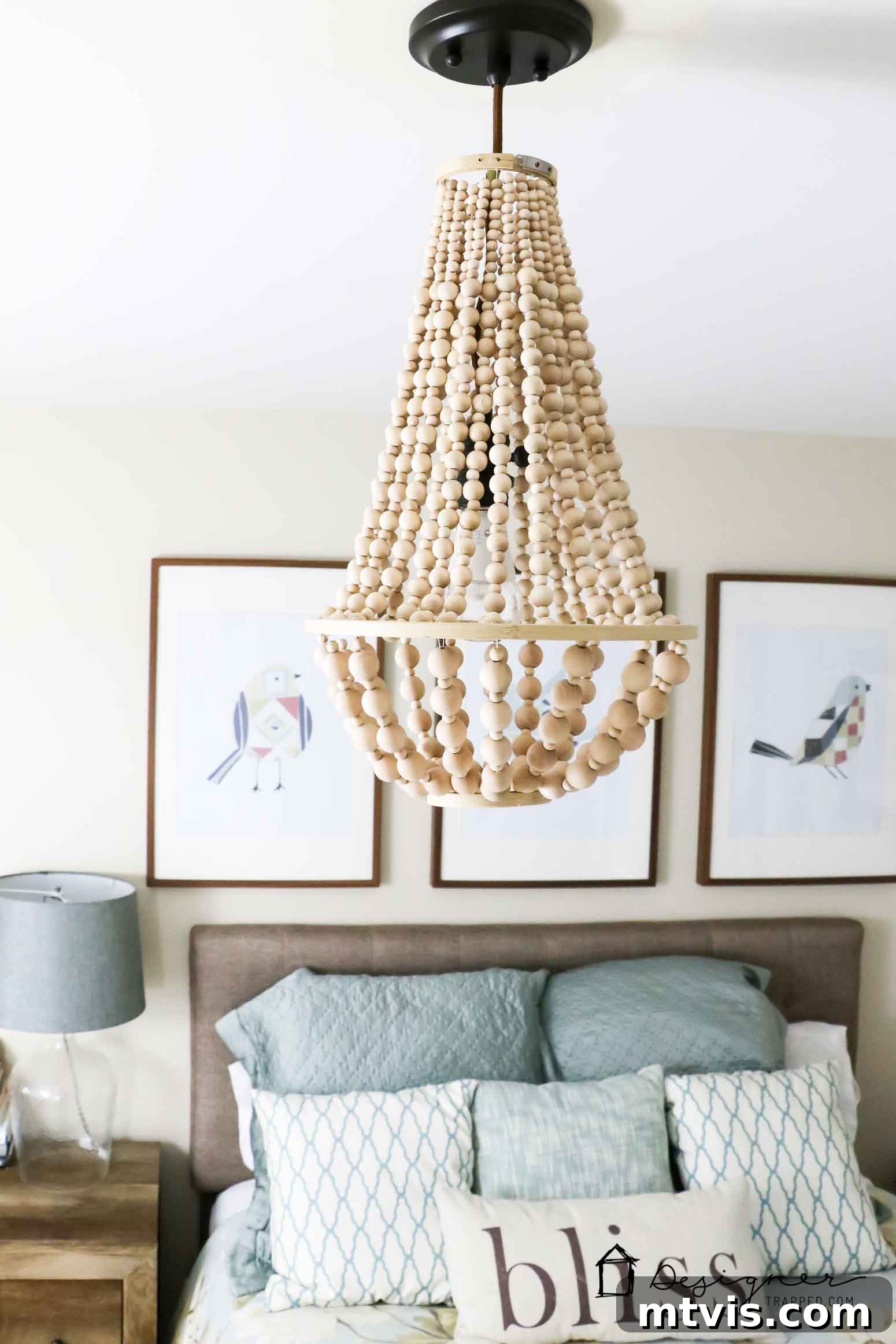 Crafting Your Dream Wood Bead Chandelier 2 diy wood bead chandelier hanging in bedroom