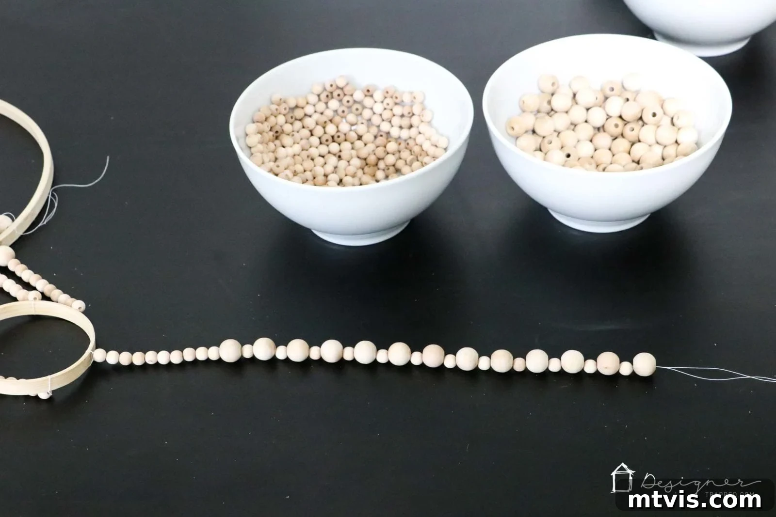 OMG, I love this DIY chandelier made from wood beads. It looks like it may take a while, but it doesn't look hard! I've wanted a wood bead chandelier but they are so expensive. Totally making this.