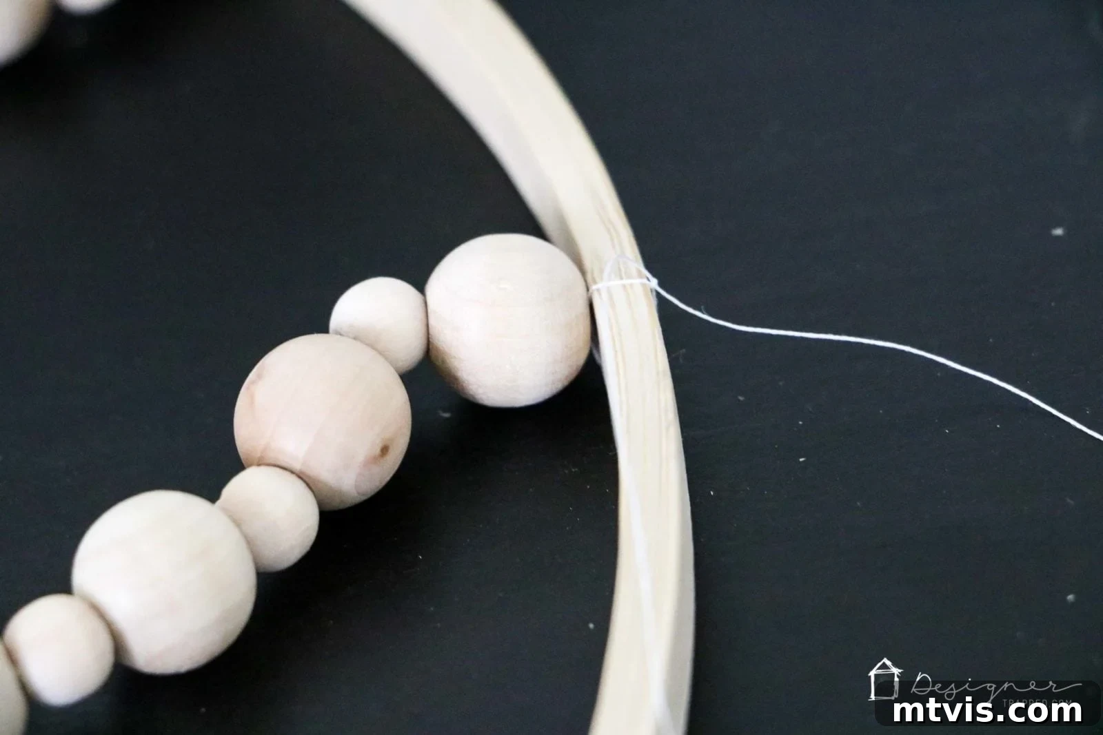 OMG, I love this DIY chandelier made from wood beads. It looks like it may take a while, but it doesn't look hard! I've wanted a wood bead chandelier but they are so expensive. Totally making this.