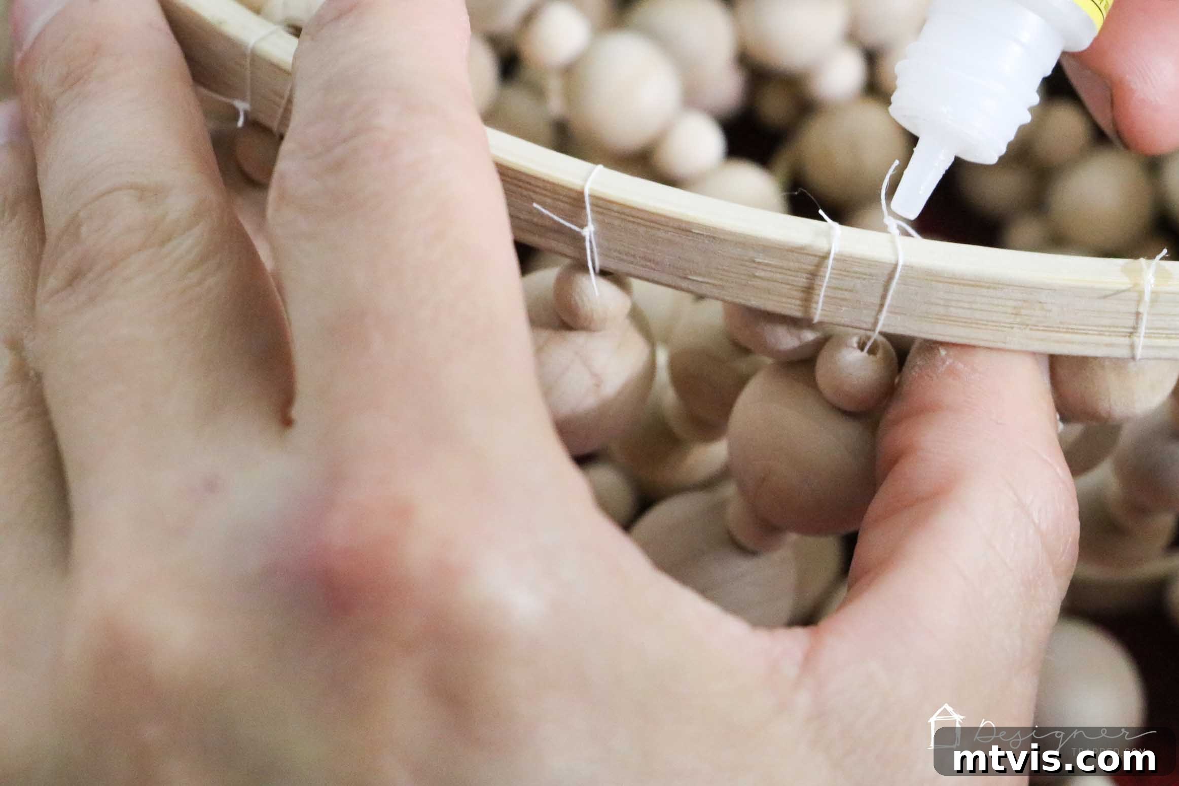 OMG, I love this DIY chandelier made from wood beads. It looks like it may take a while, but it doesn't look hard! I've wanted a wood bead chandelier but they are so expensive. Totally making this.