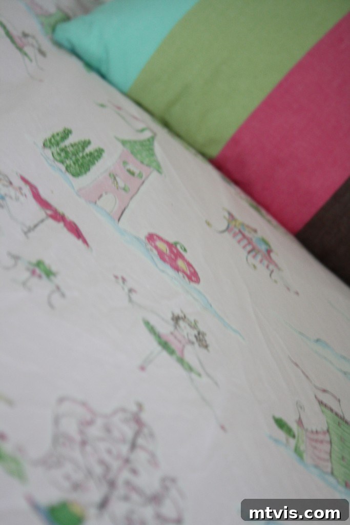 Princess Bed with Custom Headboard Design Elegant DIY upholstered headboard with custom bedding in a shared girls' room