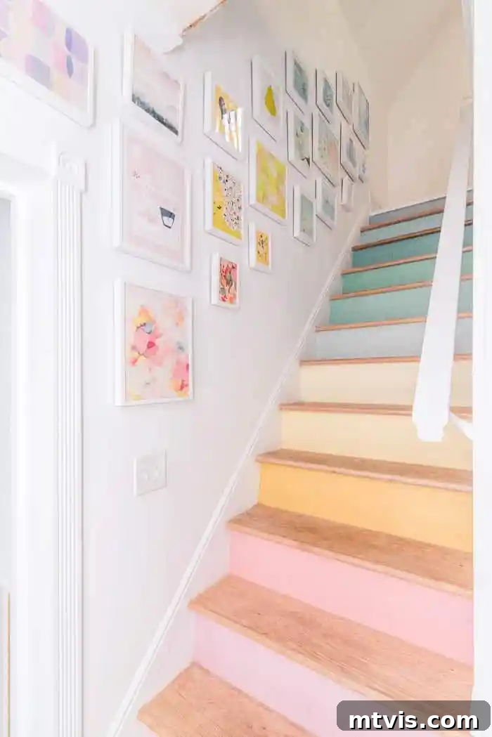 Chic Stair Risers: Elevate Your Home's Style 5 Staircase with pastel rainbow painted risers, adding a colorful and cheerful touch.