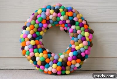 Handmade felt ball wreath in various colors for festive decor