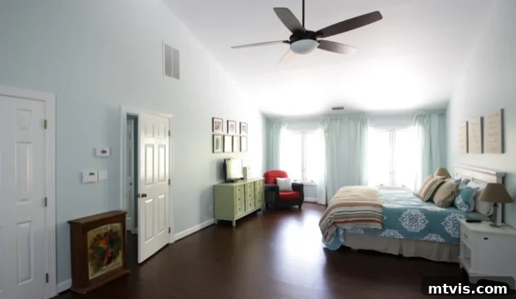 Close-up of a VELUX skylight showcasing its sleek design and trim work against a white ceiling.