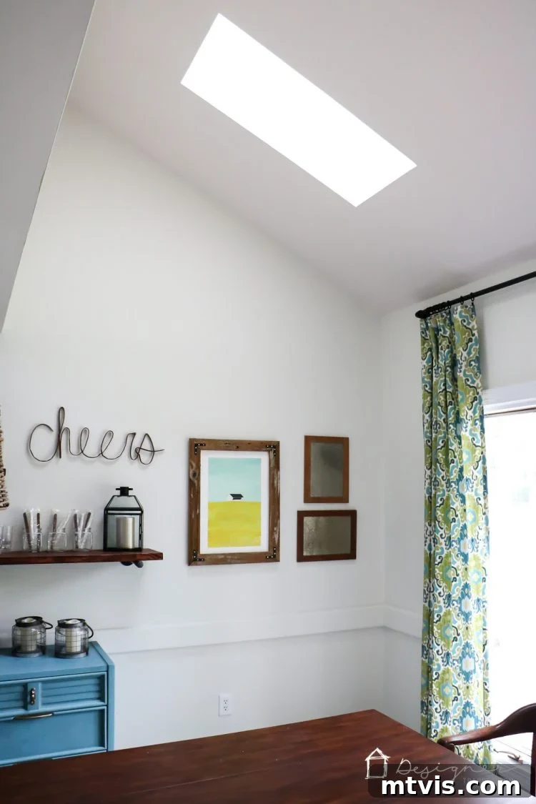 A beautifully illuminated living space, highlighting the architectural appeal and bright ambiance created by VELUX skylights.