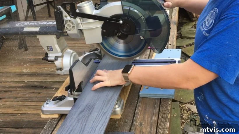Billy Bookcase Brilliance: IKEA Hacks for Ultimate Storage 7 A craftsman uses a table saw to precisely cut wood planks, preparing them for installation in the IKEA Billy bookcase hack.