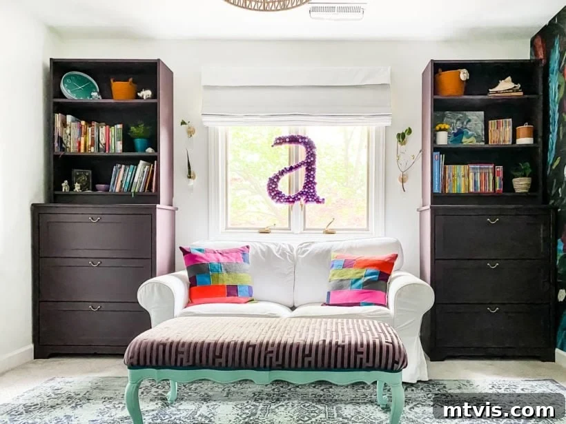 IKEA Billy bookcases painted a rich deep purple color, now situated in a girl's updated bedroom