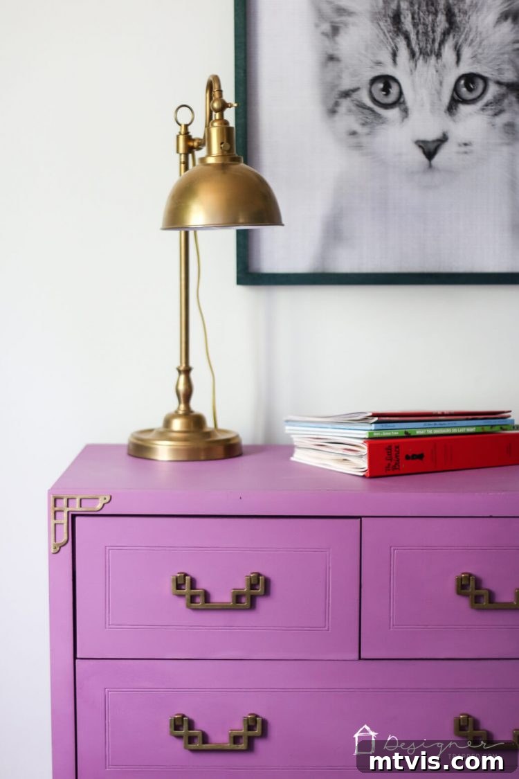 Transform Your Furniture: The DIY Restoration Guide 10 Close-up of the restored dresser with decorative elements, highlighting the detailed paint and hardware.