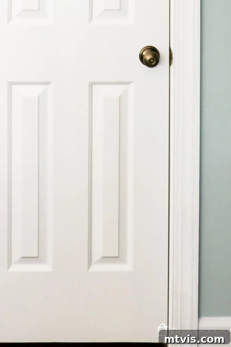 Black Doors: Instant Drama, Minimal Expense 12 Love the idea of black interior doors for an affordable interior update! All you have to do is paint your doors black and update the hardware. HUGE impact!