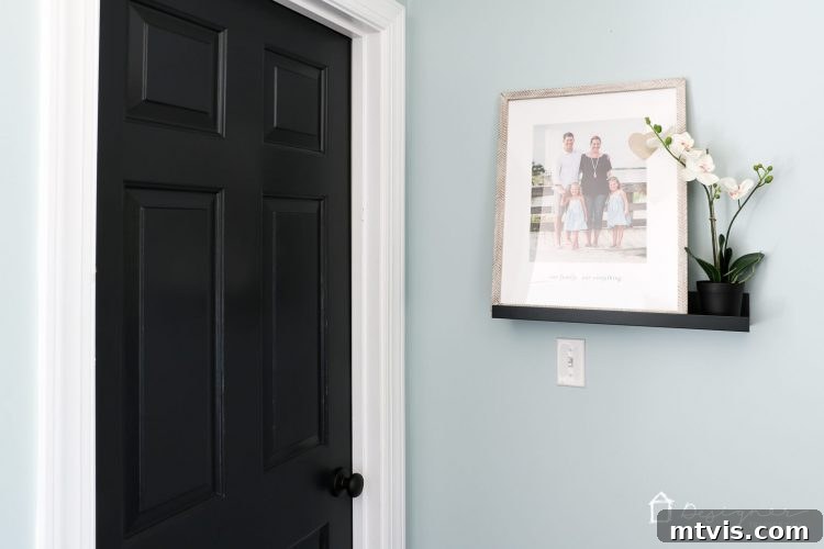 Black Doors: Instant Drama, Minimal Expense 13 Love the idea of black interior doors for an affordable interior update! All you have to do is paint your doors black and update the hardware. HUGE impact!