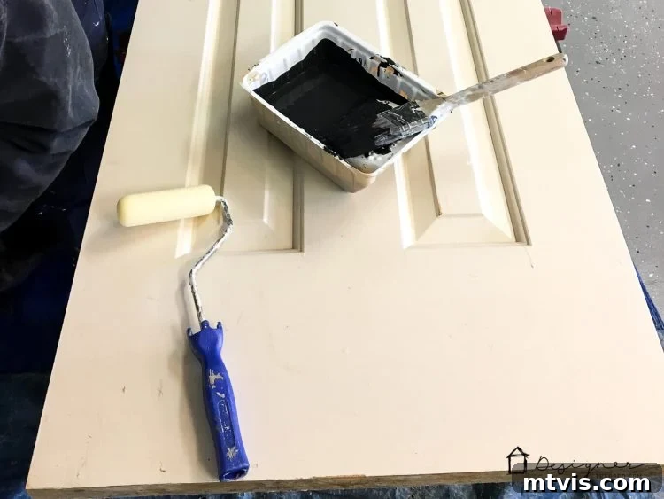 Black Doors: Instant Drama, Minimal Expense 4 Love the idea of black interior doors for an affordable interior update! All you have to do is paint your doors black and update the hardware. HUGE impact!