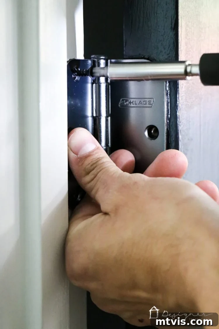 Black Doors: Instant Drama, Minimal Expense 5 Love the idea of black interior doors for an affordable interior update! All you have to do is paint your doors black and update the hardware. HUGE impact!