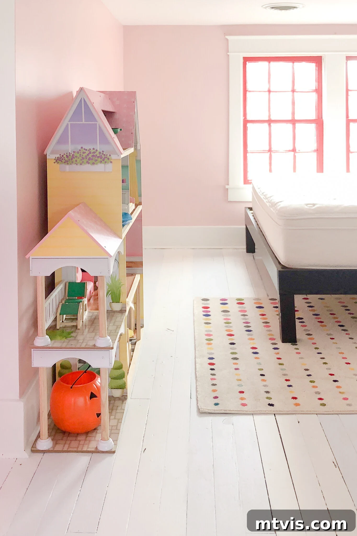 20 Affordable Flooring Ideas That Look Expensive 8 white painted hardwood floors in colorful room
