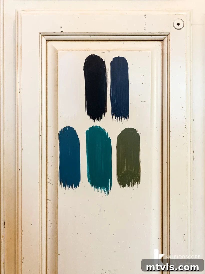 Is Painting Your Kitchen Cabinets Right for You? Essential Questions Before You Begin 6 Close-up of a painted cabinet with a Fusion Mineral Paint sample, highlighting its smooth finish.