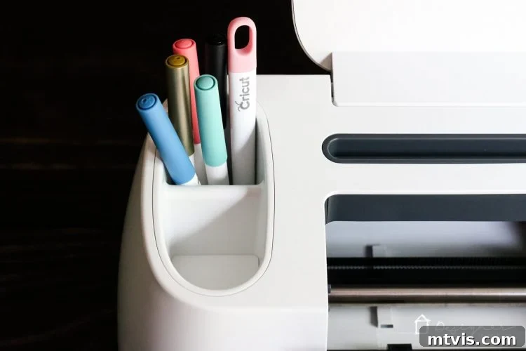 Unleash Every Idea with Cricut Maker 12 Organize your crafting space with Cricut Maker's deeper front tool storage and dual tool cups, designed for efficient access to pens and blades.