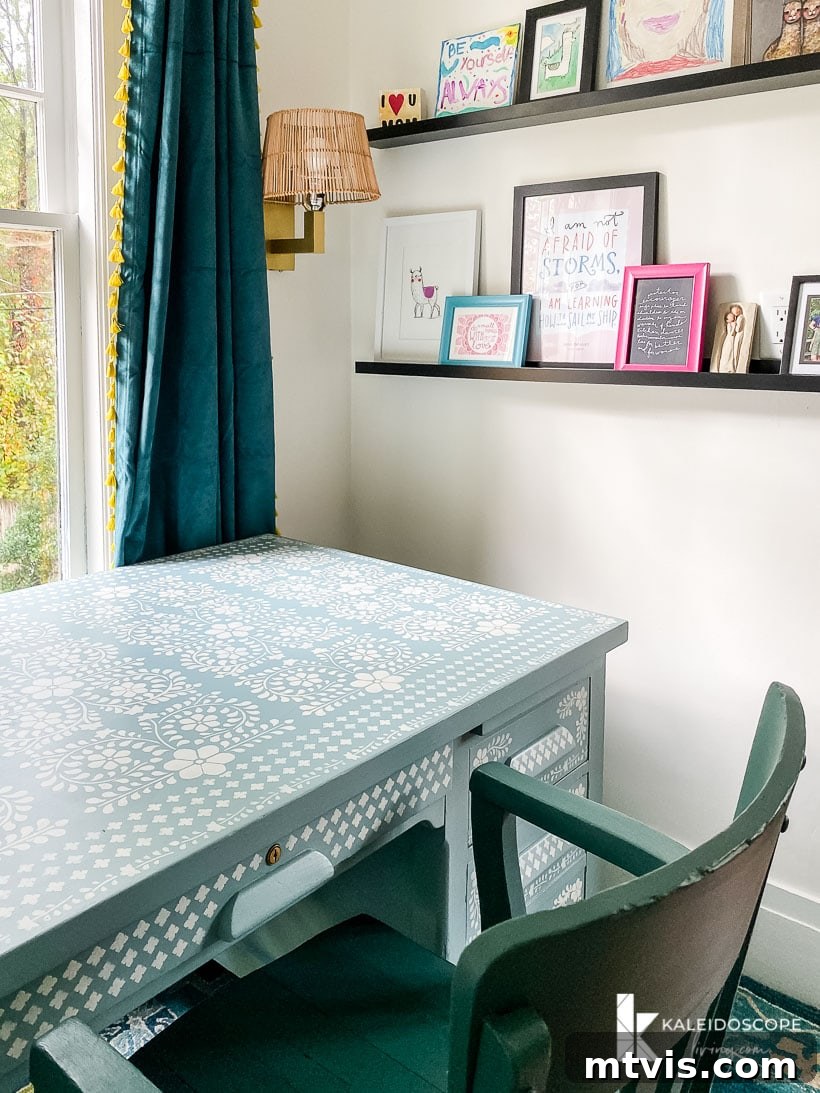 Transform Your Space: 27 Gallery Wall Ideas and Practical Hacks 15 A charming gallery wall displayed on art ledges within a small home office, effectively enhancing the space with personalized decor and visual interest.