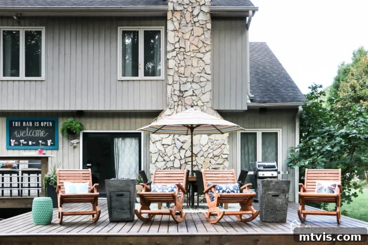 Come check out our complete and total DIY deck makeover! It took months for us to rebuild it and furnish it, but is so worth it! This inviting deck features modern outdoor furniture, stylish fire columns, and ample seating for entertaining guests or relaxing with family.